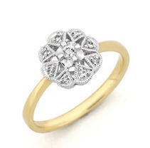.09 ct. t.w. Diamond Flower Ring (H-I, I1)